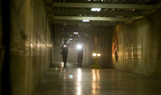 Illustration for article titled Your first look at the "monsters versus security guards" flick Cost of Living